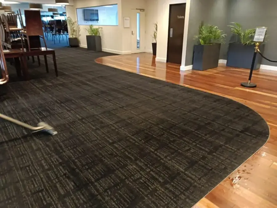Extraction wand drying commercial carpet in a Federal Way lobby